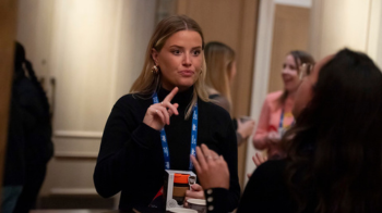 Person in conversation at IAB event